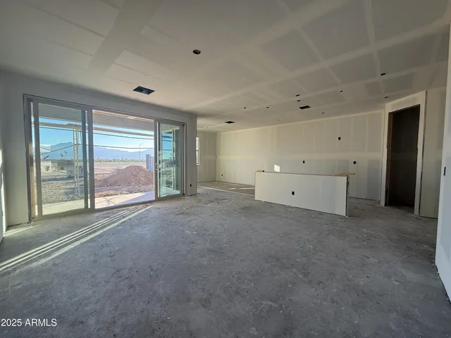 a big room with closet and windows