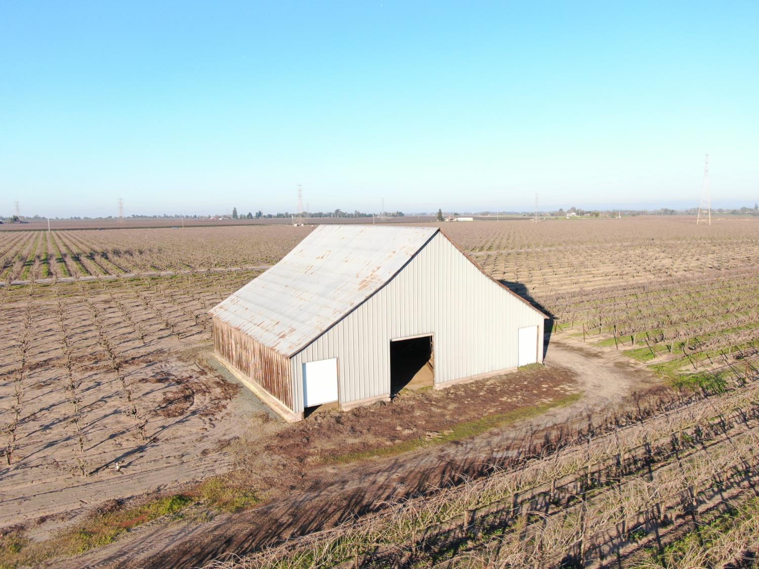 14248 East Peltier Road Acampo, CA 95220 - Photo 30 of 44 a view of a terrace with a lake