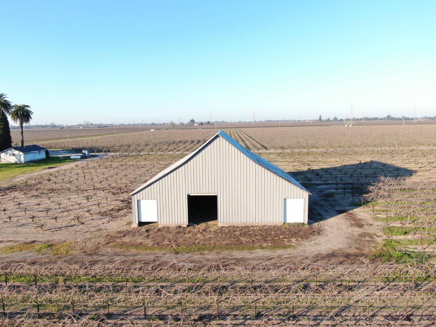 14248 East Peltier Road Acampo, CA 95220 - Photo 31 of 44 a view of a terrace with a lake