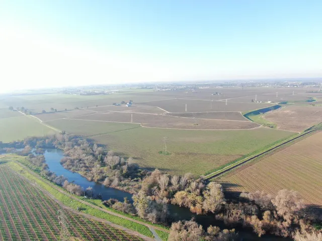 a view of an ocean and mountain