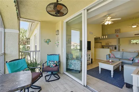 a view of a livingroom with furniture and a table