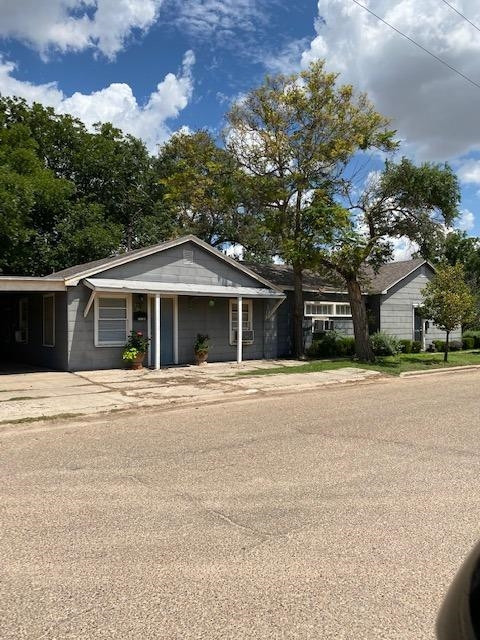 3520 26th Street Lubbock, TX 79410 - Photo 6 of 7 front view of a house with a yard
