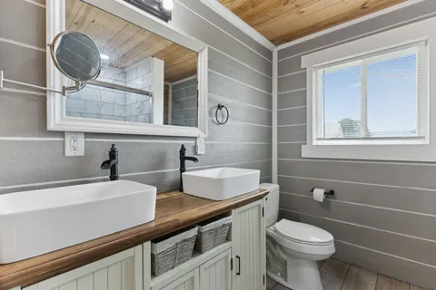 a bathroom with a sink and a toilet