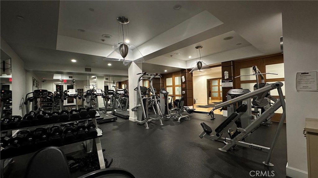 100 South Alameda Street, Unit 321 Los Angeles, CA 90012 - Photo 11 of 17 a view of a room with gym equipment