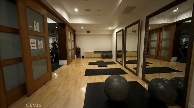 a gym room with gym equipment