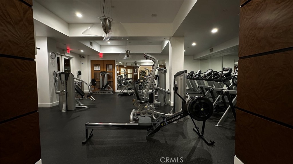 100 South Alameda Street, Unit 321 Los Angeles, CA 90012 - Photo 16 of 17 a view of a room with gym equipment
