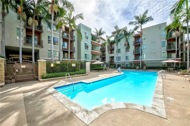 a view of a building with a swimming pool