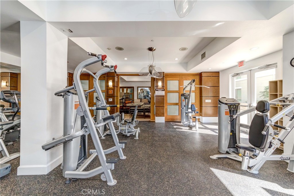100 South Alameda Street, Unit 321 Los Angeles, CA 90012 - Photo 8 of 17 a view of a room with gym equipment