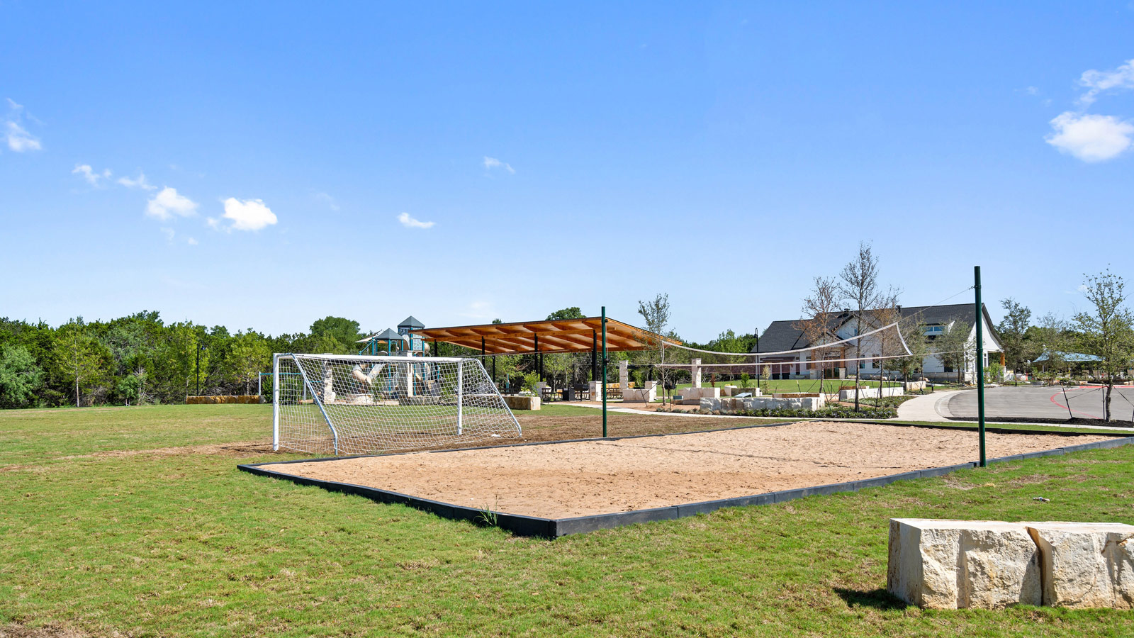 2564 Whittler Road Leander, TX 78641 - Photo 34 of 35 a view of a playground with basketball court
