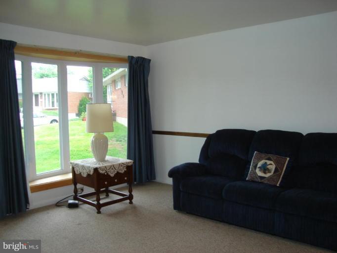 1502 Draper Court Rosedale, MD 21237 - Photo 5 of 10 a living room with furniture and a window