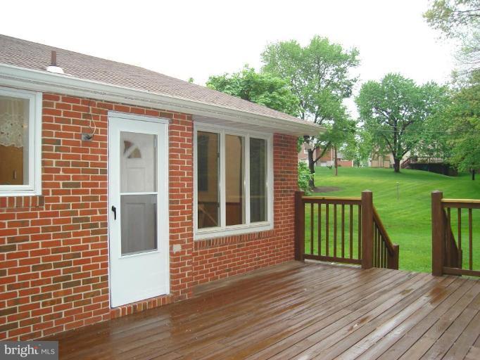 1502 Draper Court Rosedale, MD 21237 - Photo 7 of 10 a view of a house with a yard