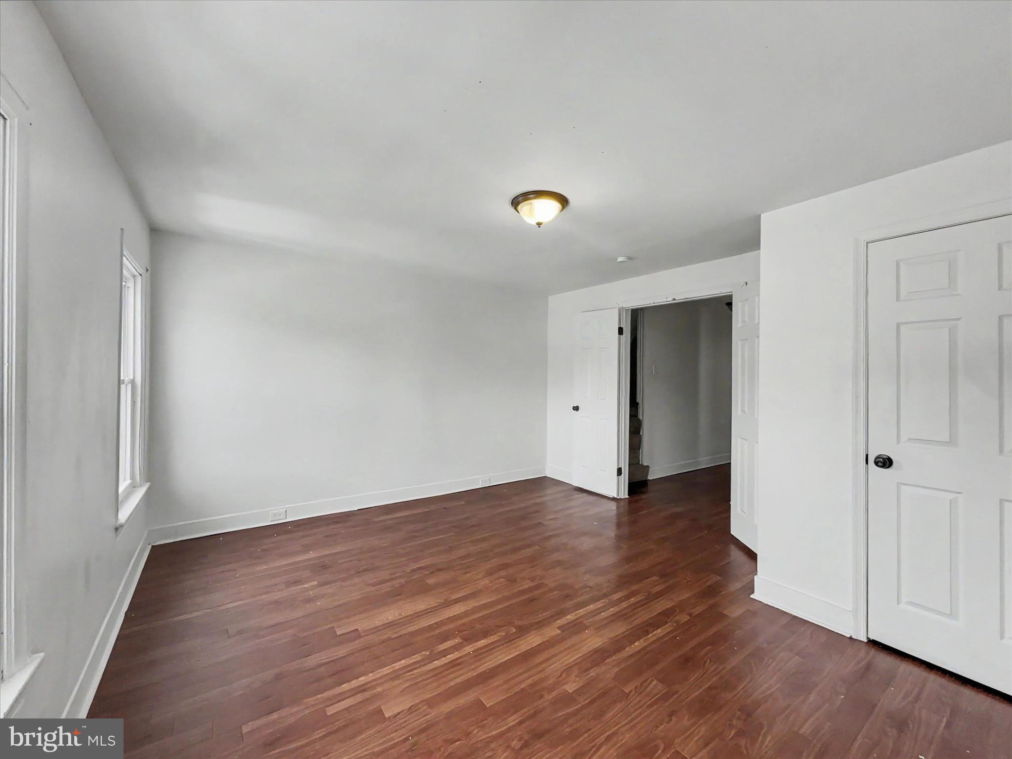 368 Norway Street York, PA 17403 - Photo 11 of 21 a view of an empty room with wooden floor and a window