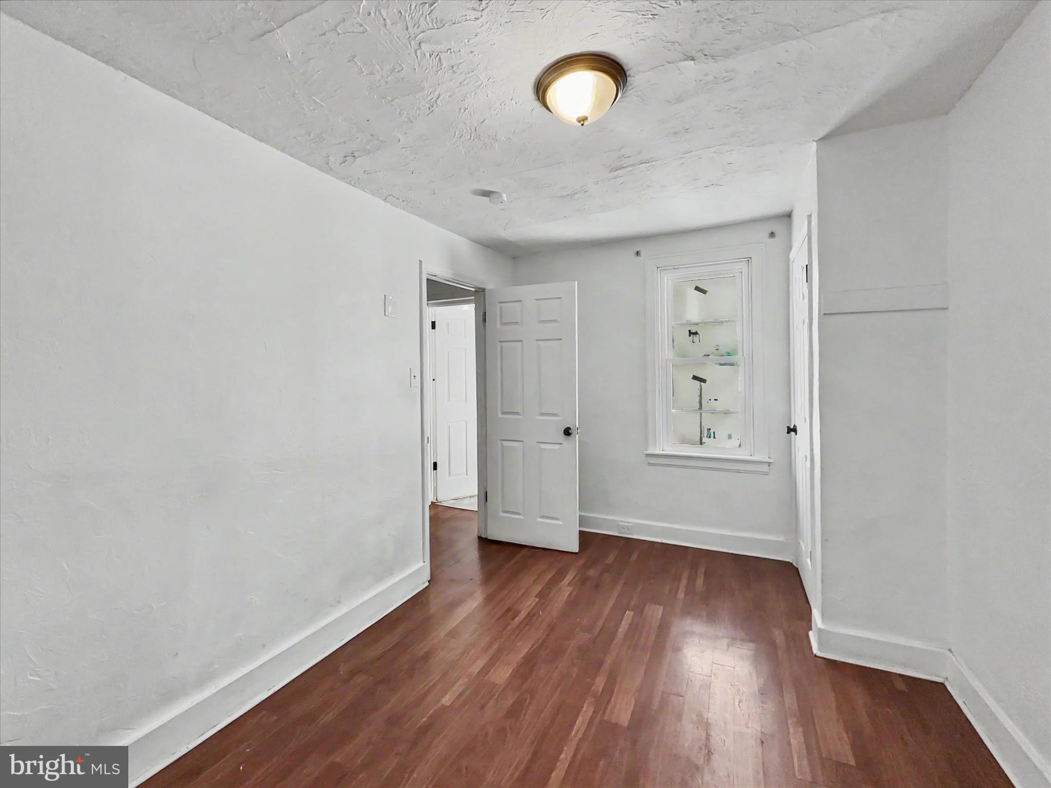 368 Norway Street York, PA 17403 - Photo 13 of 21 an empty room with wooden floor and windows