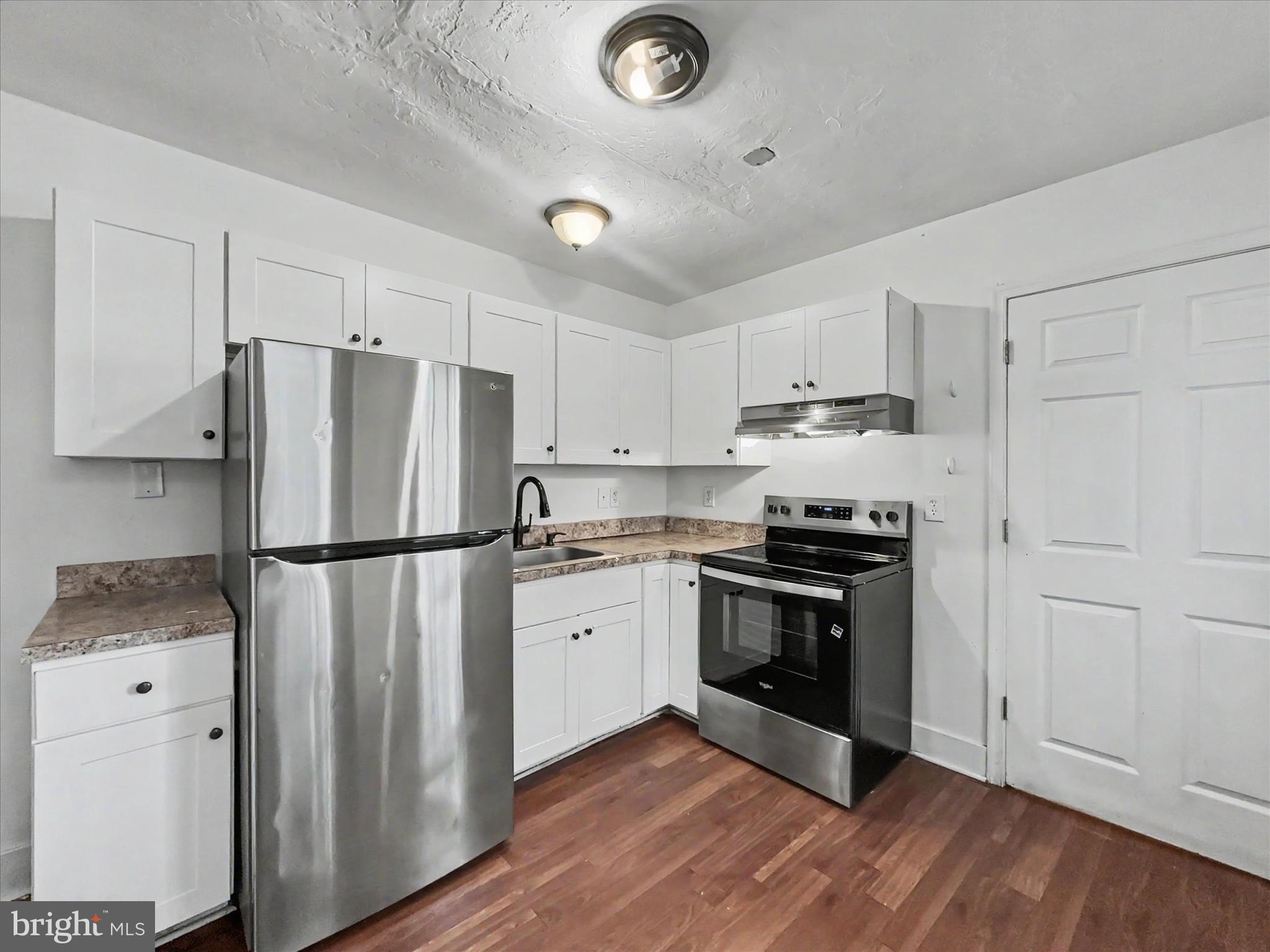368 Norway Street York, PA 17403 - Photo 6 of 21 a kitchen with stainless steel appliances a refrigerator sink and cabinets