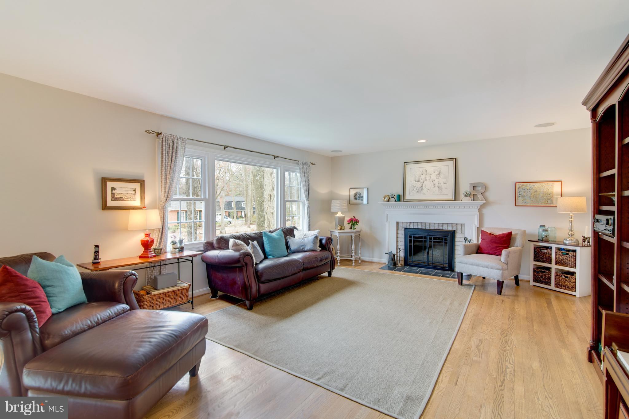 2344 Citation Court Reston, VA 20191 - Photo 4 of 30 Living Room w/ wood burning fireplace