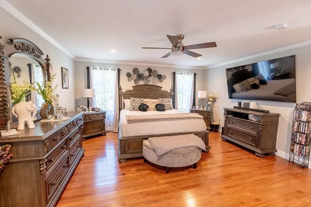 a bathroom with a double vanity sink and a toilet