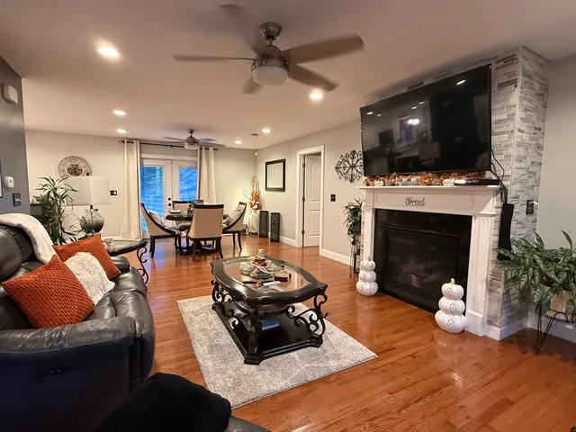 a kitchen with appliances a sink a counter top space and cabinets