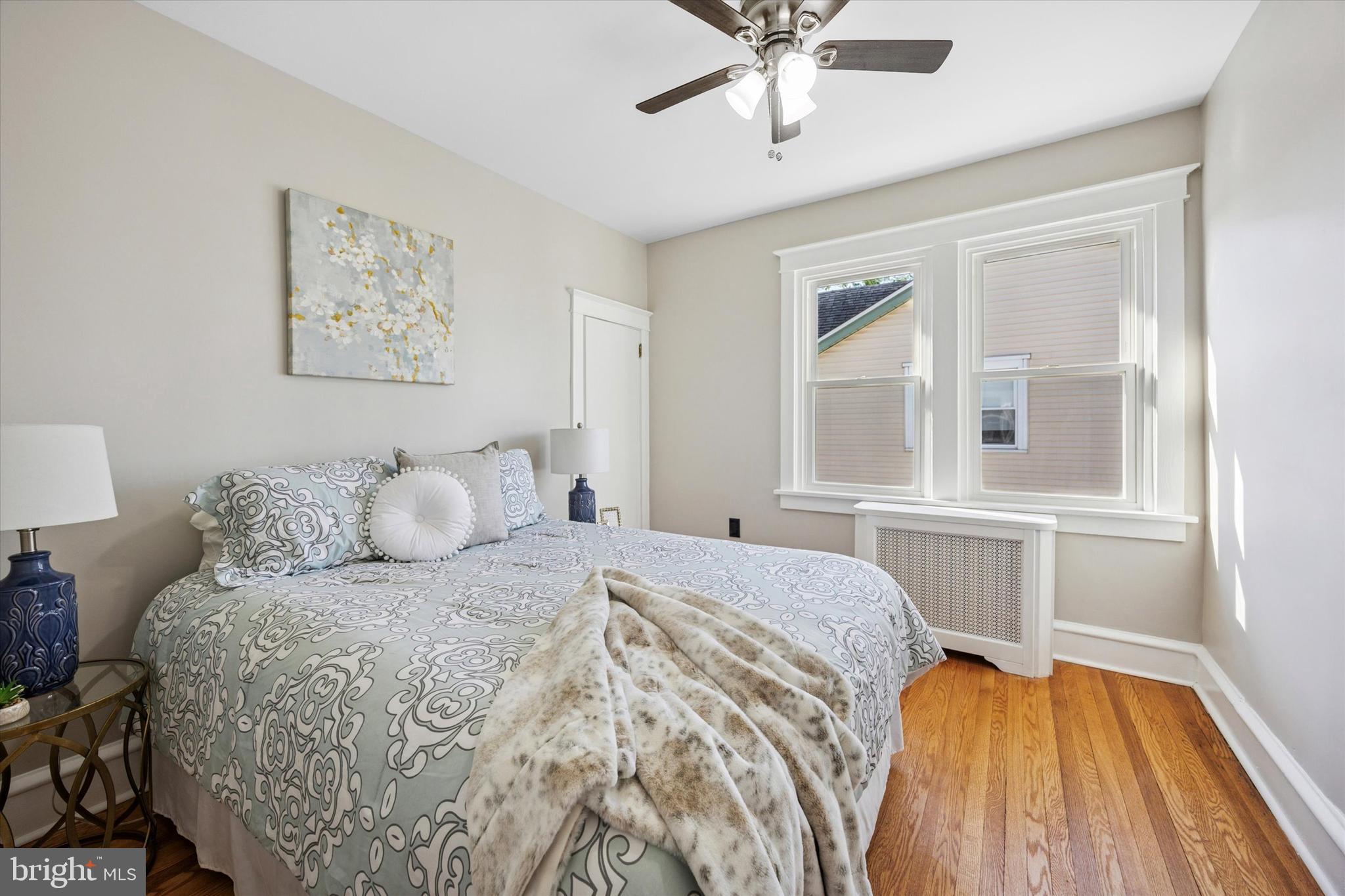 110 Sycamore Road Havertown, PA 19083 - Photo 12 of 25 a bedroom with a large bed and a window