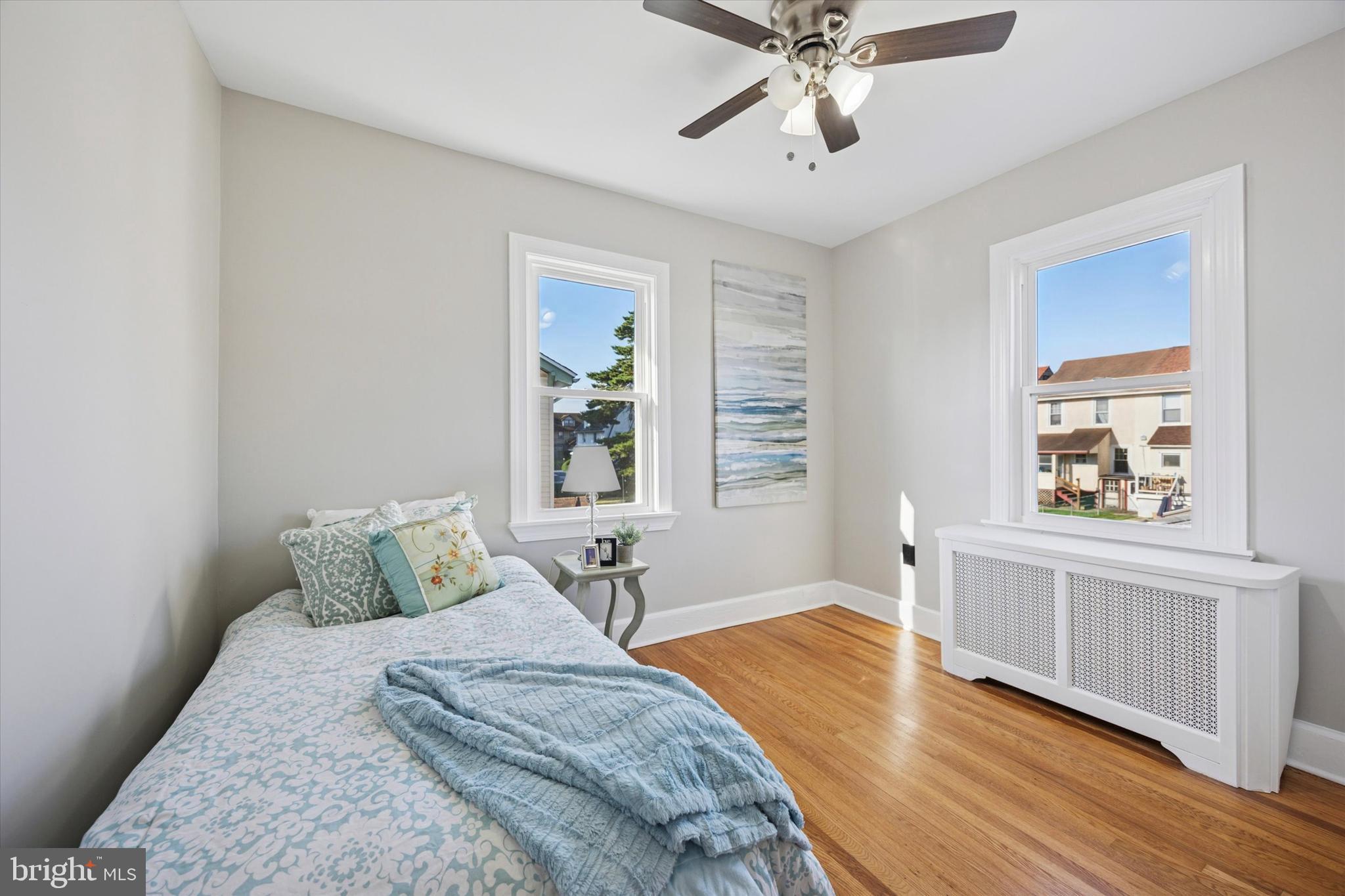 110 Sycamore Road Havertown, PA 19083 - Photo 15 of 25 a bedroom with a bed and a window