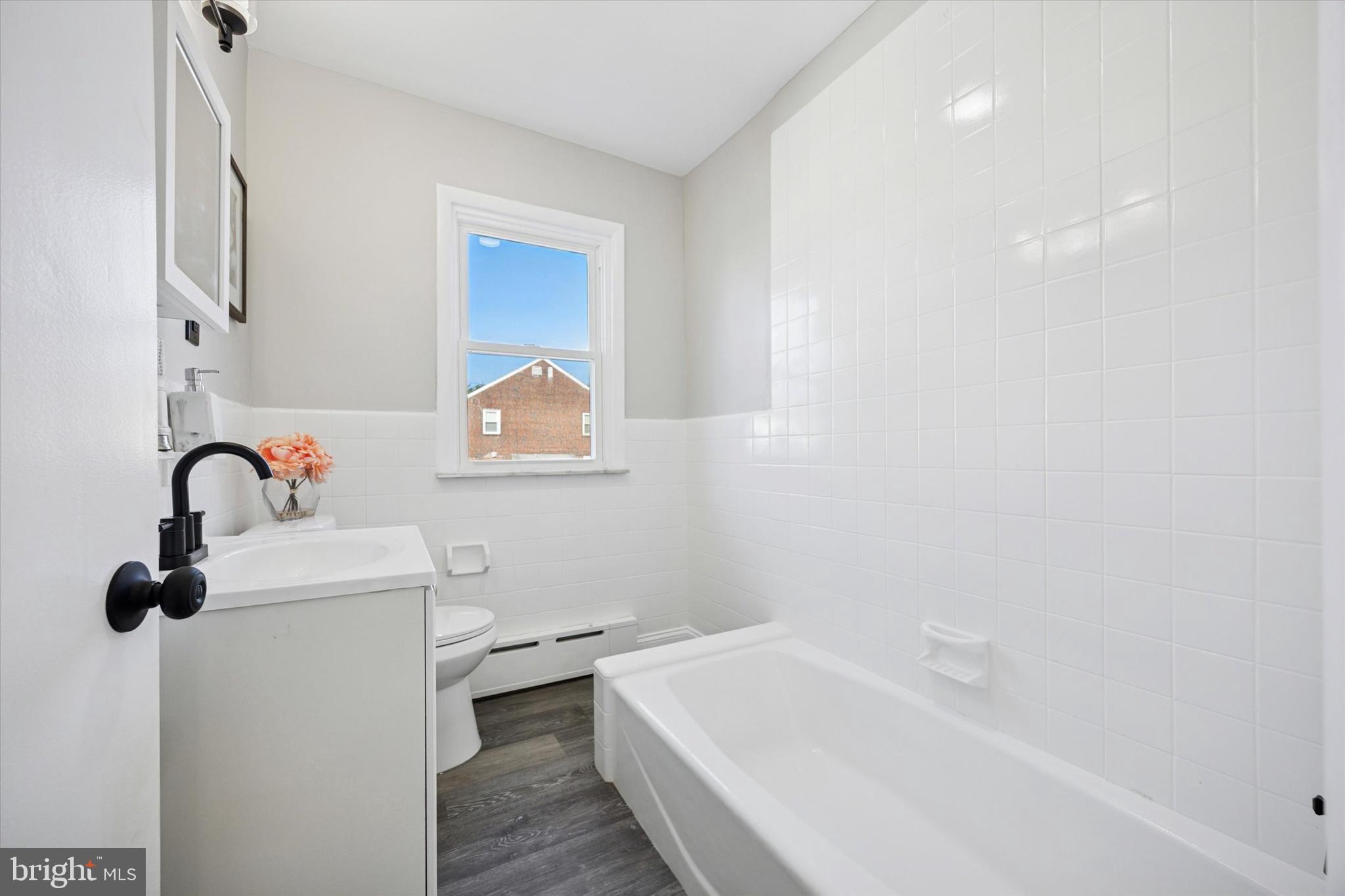 110 Sycamore Road Havertown, PA 19083 - Photo 18 of 25 a bathroom with a sink a toilet and bathtub