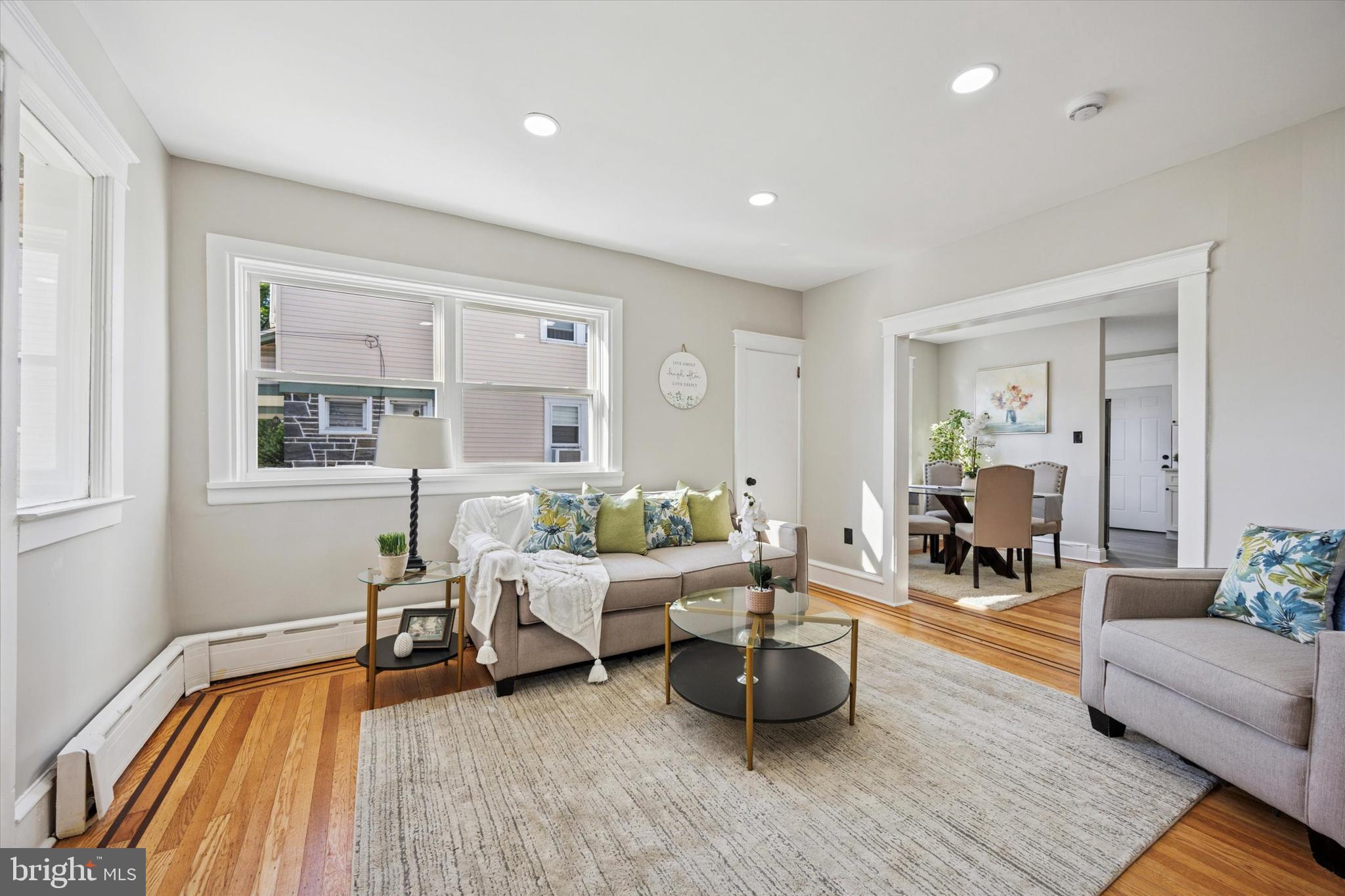 110 Sycamore Road Havertown, PA 19083 - Photo 3 of 25 a living room with furniture and wooden floor