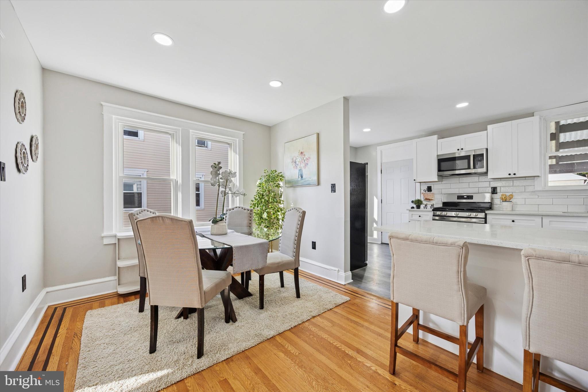 110 Sycamore Road Havertown, PA 19083 - Photo 5 of 25 a view of a dining room with furniture and wooden floor