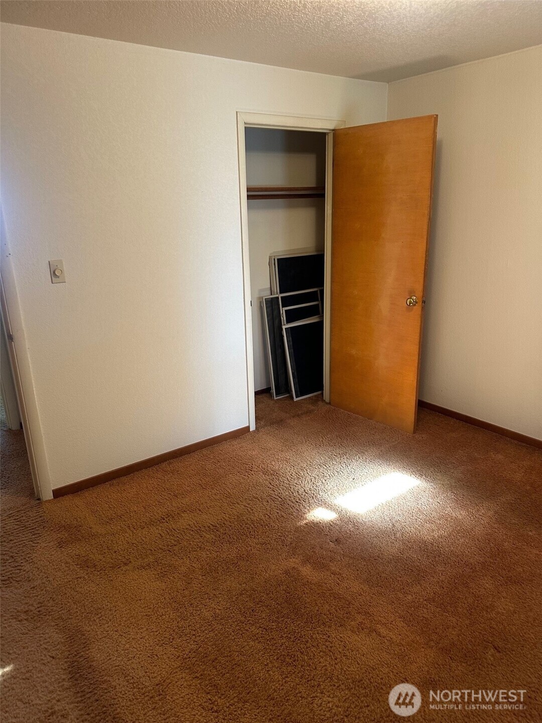 3504 Northeast 135th Street Seattle, WA 98125 - Photo 22 of 35 a view of an empty room with a kitchen