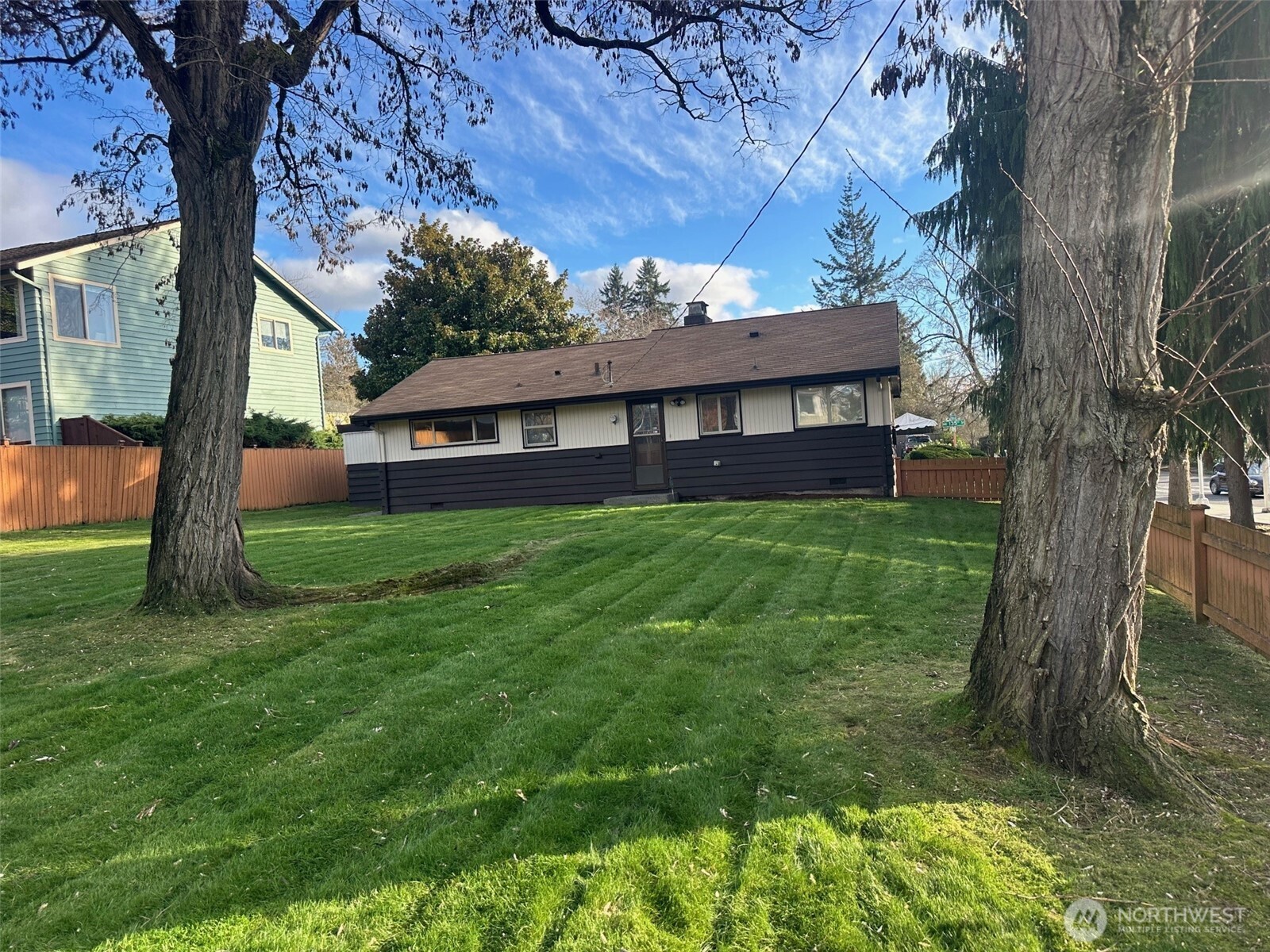 3504 Northeast 135th Street Seattle, WA 98125 - Photo 34 of 35 a view of a house with a yard