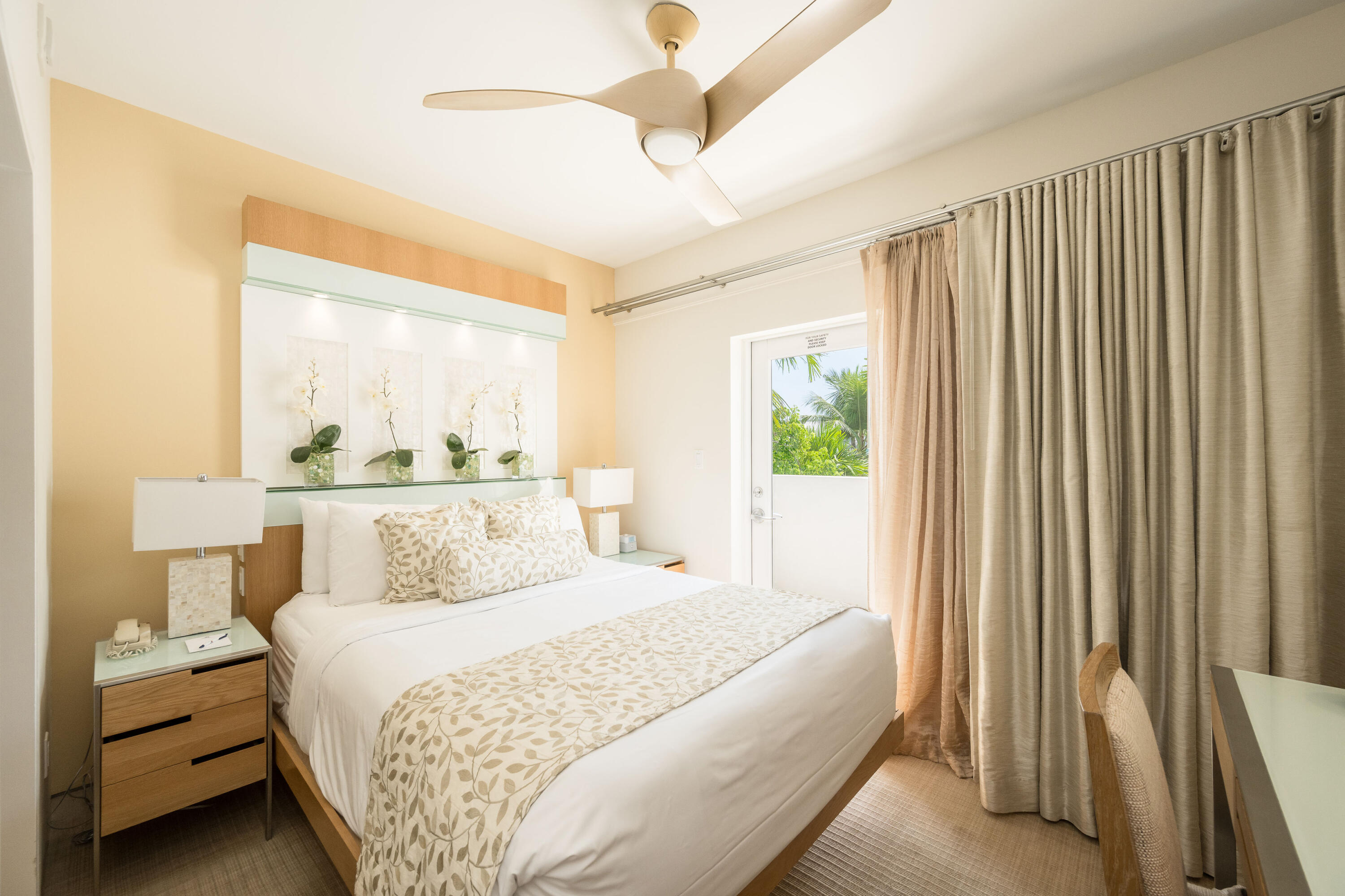 1401 Simonton Street, Unit 20 Key West, FL 33040 - Photo 19 of 32 a bedroom with a bed and a window