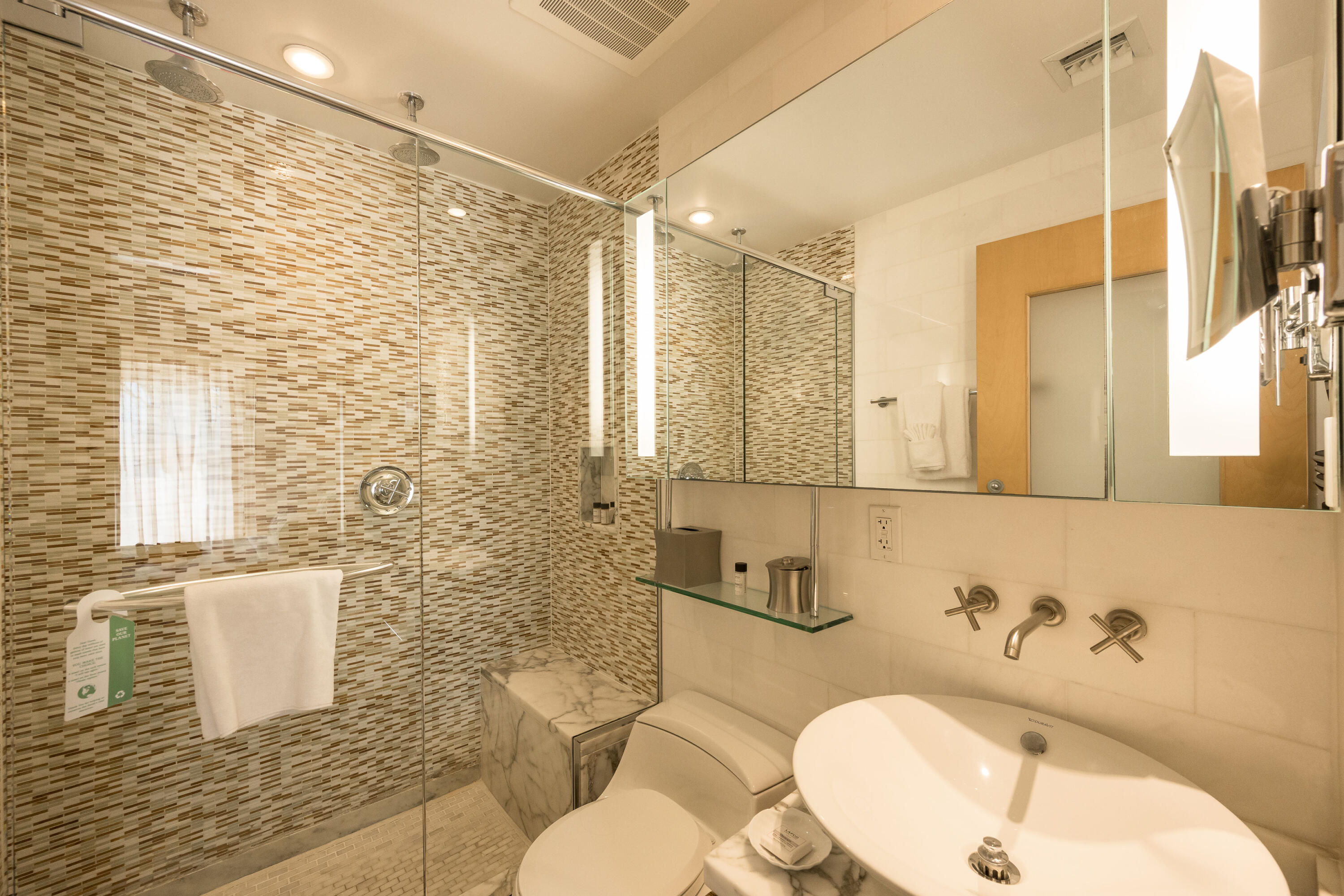 1401 Simonton Street, Unit 20 Key West, FL 33040 - Photo 21 of 32 a bathroom with a sink a toilet and shower