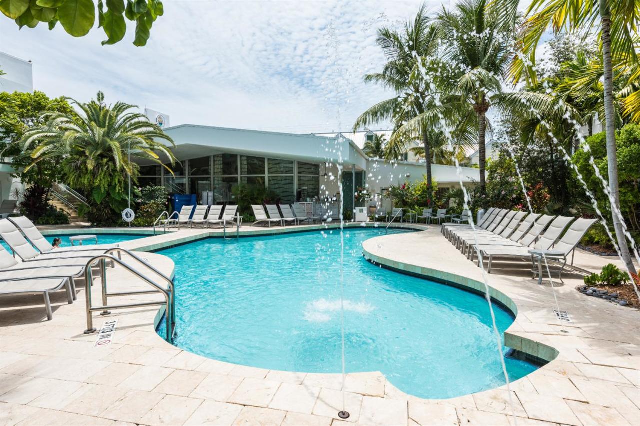 1401 Simonton Street, Unit 20 Key West, FL 33040 - Photo 27 of 32 a view of a swimming pool with lounge chair