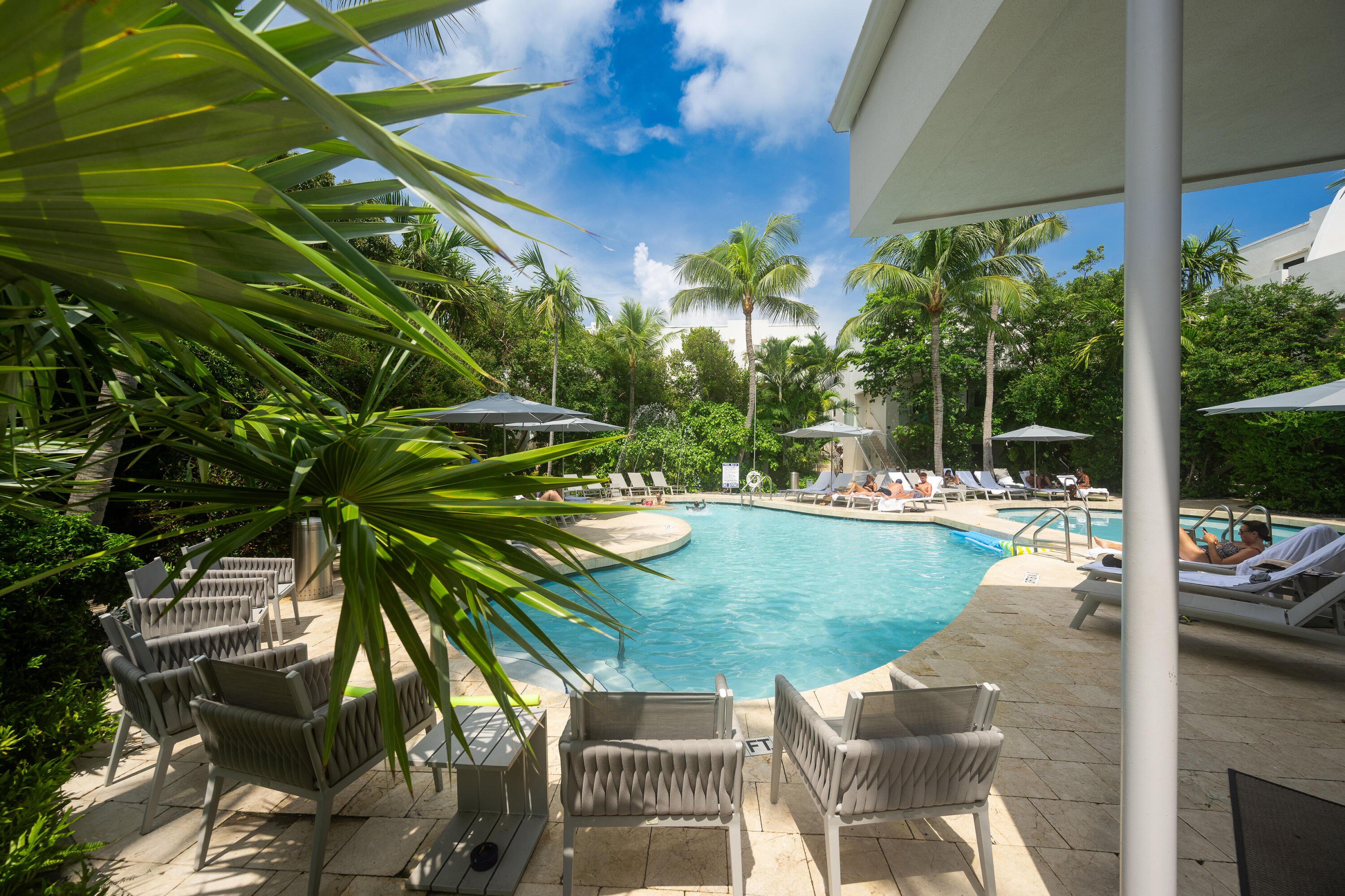 1401 Simonton Street, Unit 20 Key West, FL 33040 - Photo 4 of 32 a view of a chair and tables in the patio