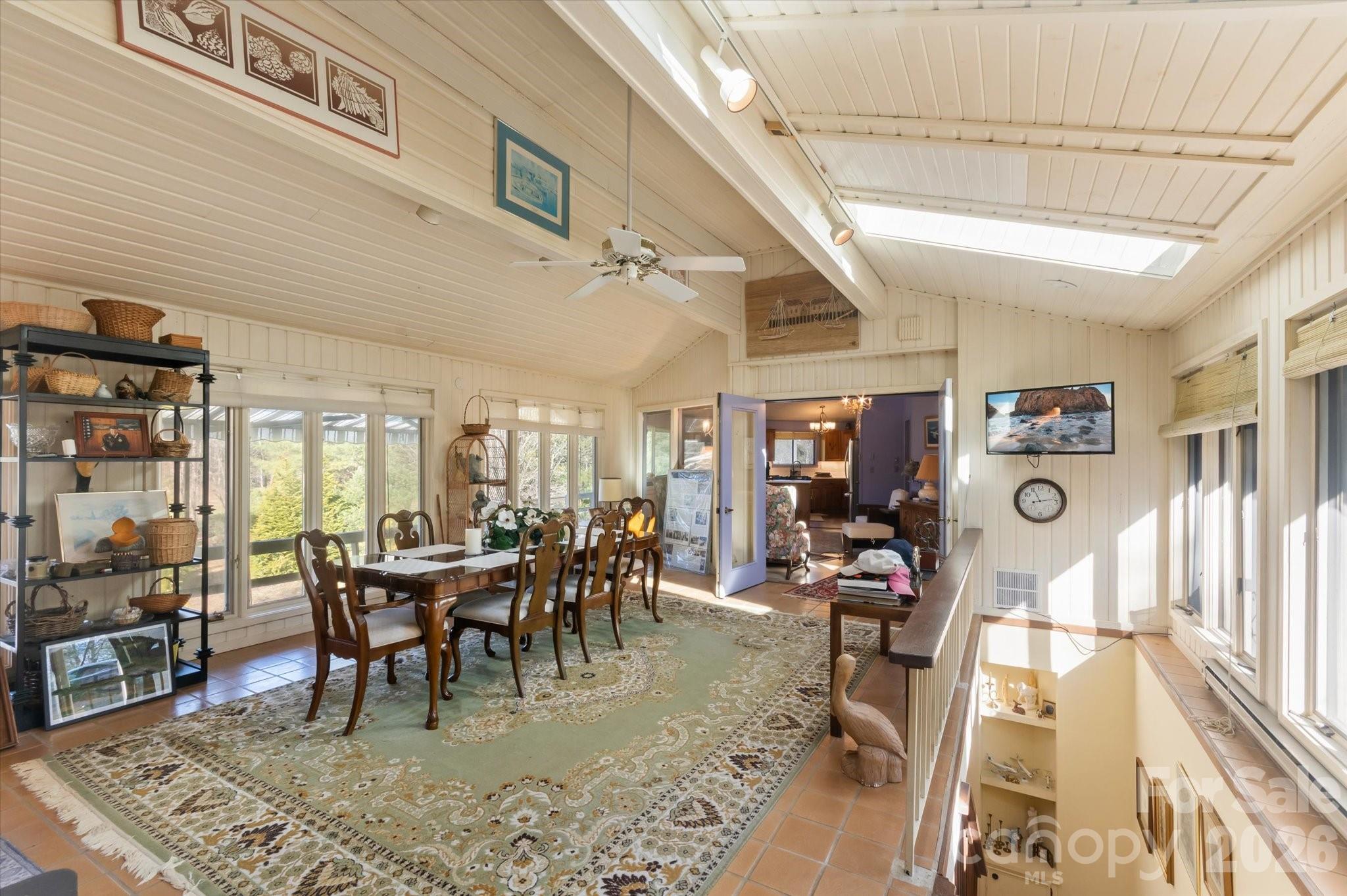1881 Brookside Camp Road Hendersonville, NC 28792 - Photo 12 of 48 a view of a dining room with furniture