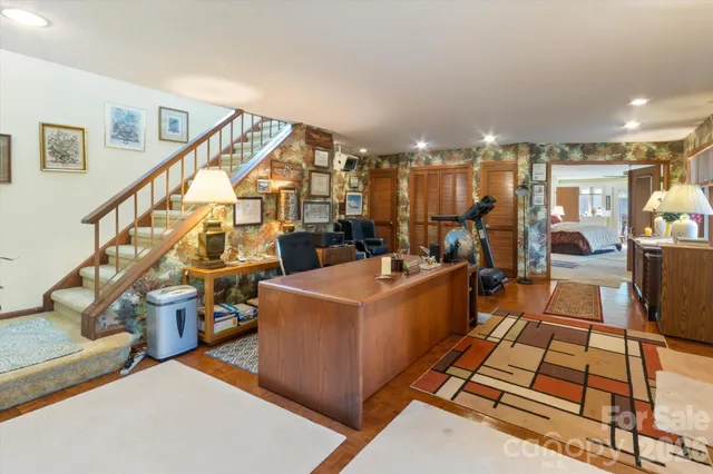 a view of living room kitchen and entryway