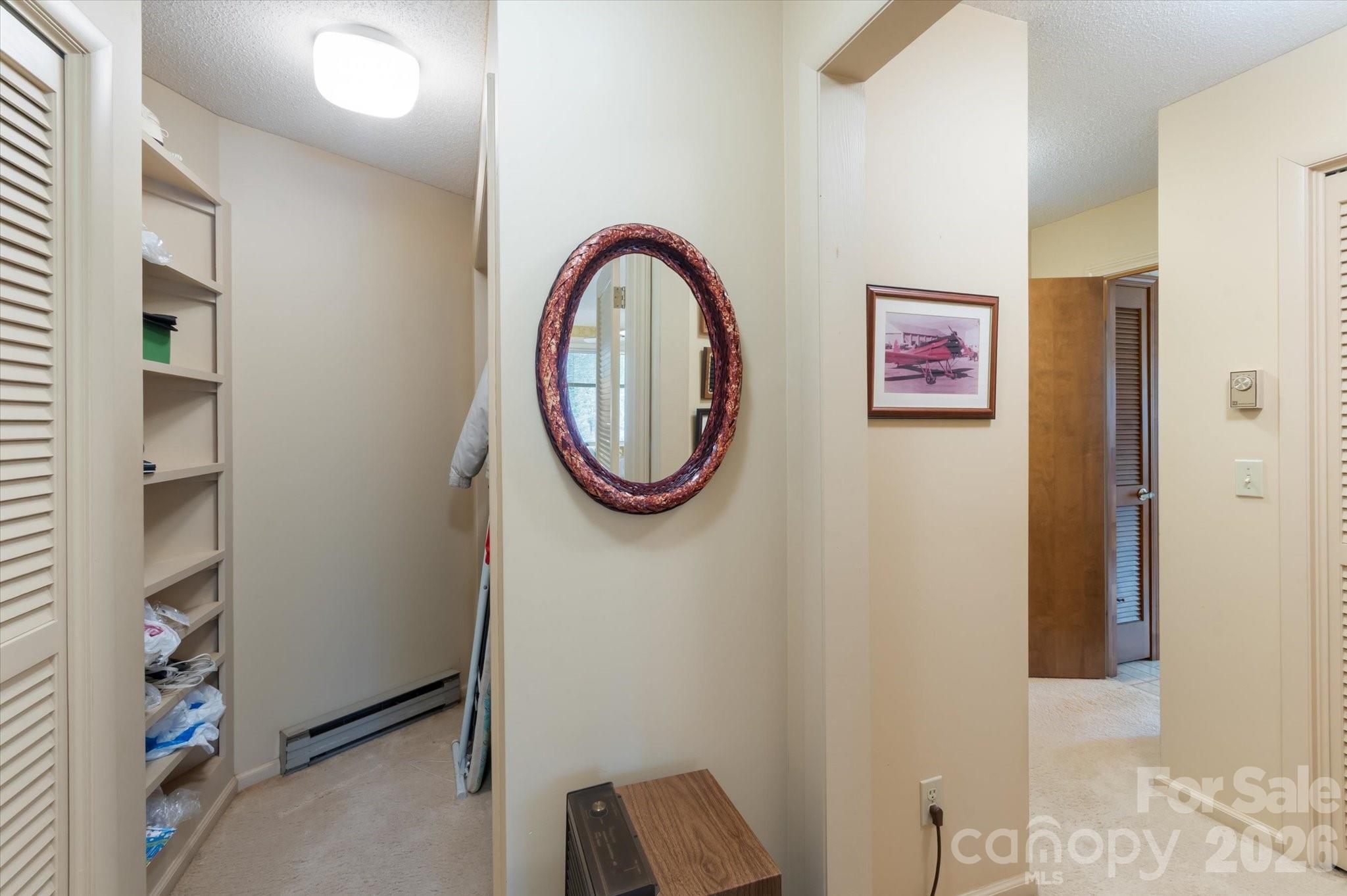 1881 Brookside Camp Road Hendersonville, NC 28792 - Photo 37 of 48 a picture of a bathroom with a sink and a mirror