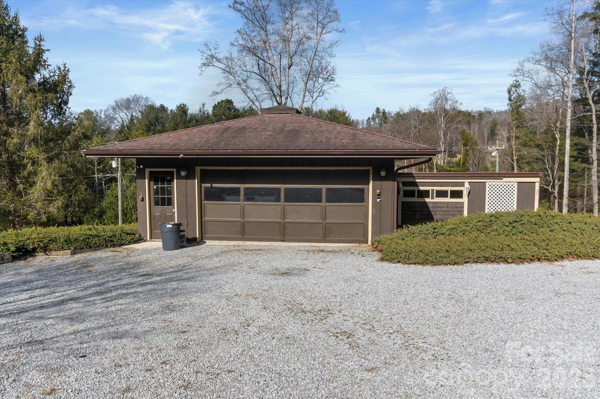 1881 Brookside Camp Road Hendersonville, NC 28792 - Photo 40 of 48 a house with trees in the background