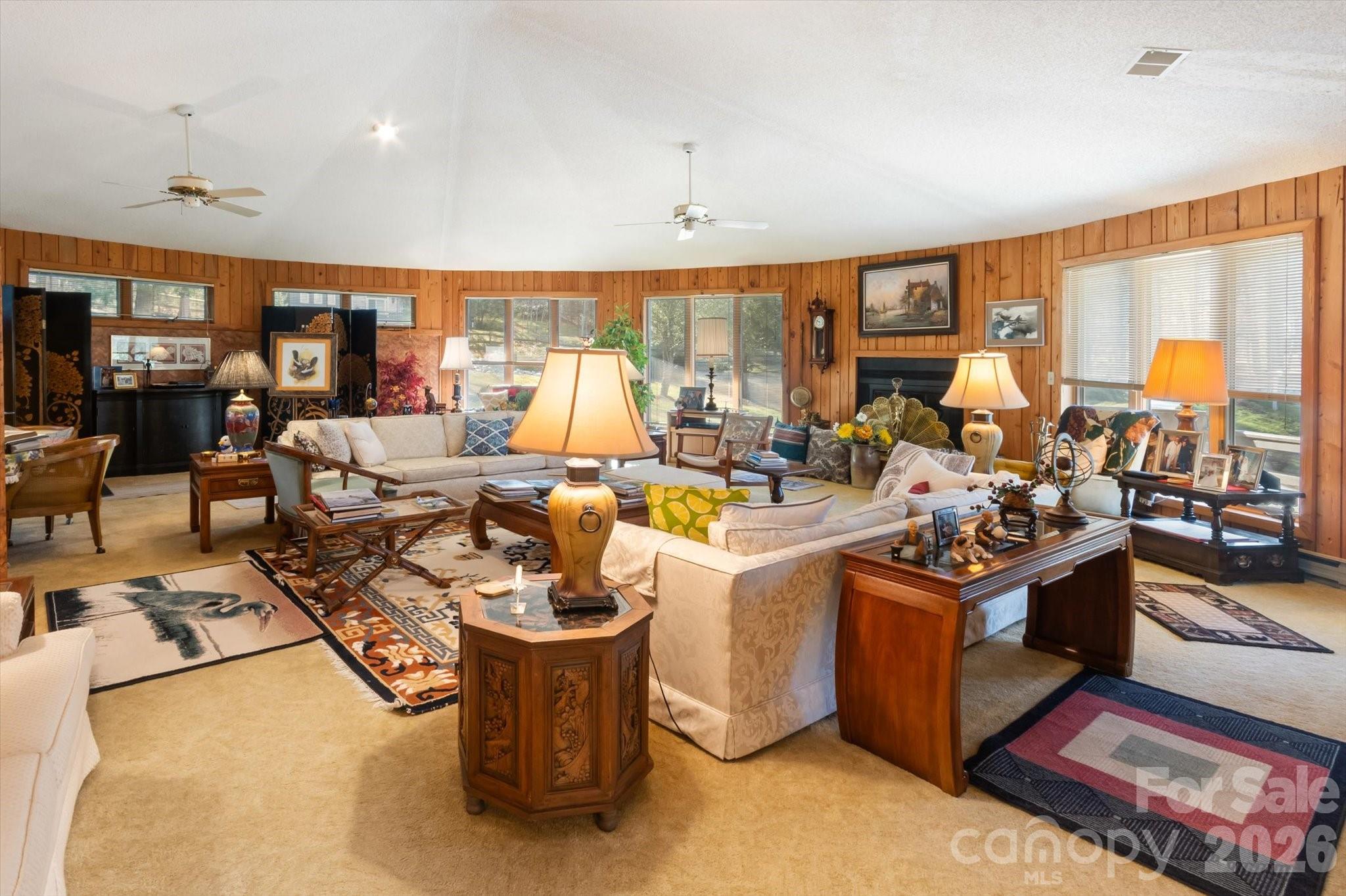 1881 Brookside Camp Road Hendersonville, NC 28792 - Photo 8 of 48 a living room with furniture and a large window