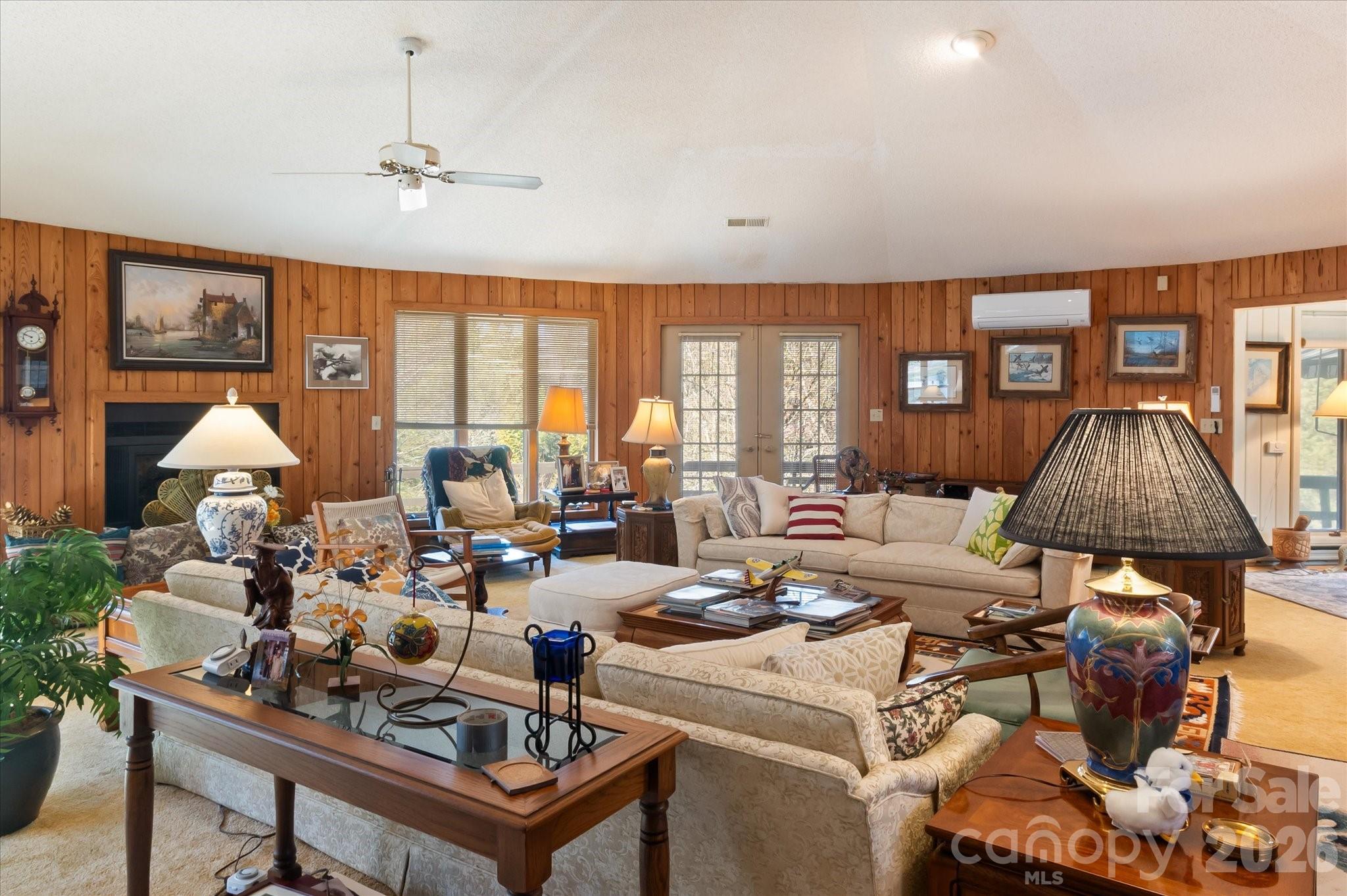 1881 Brookside Camp Road Hendersonville, NC 28792 - Photo 10 of 48 a living room with furniture and a large window
