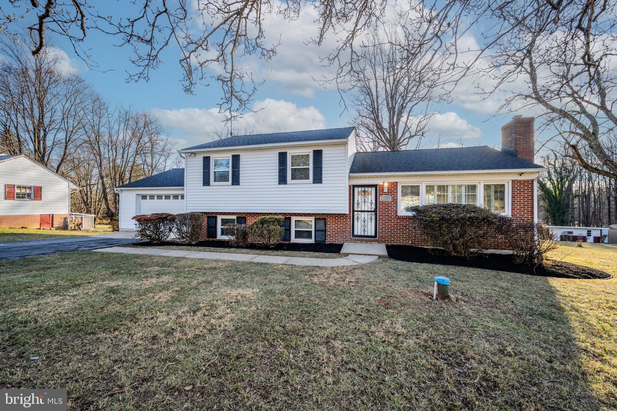 a house view with a garden space