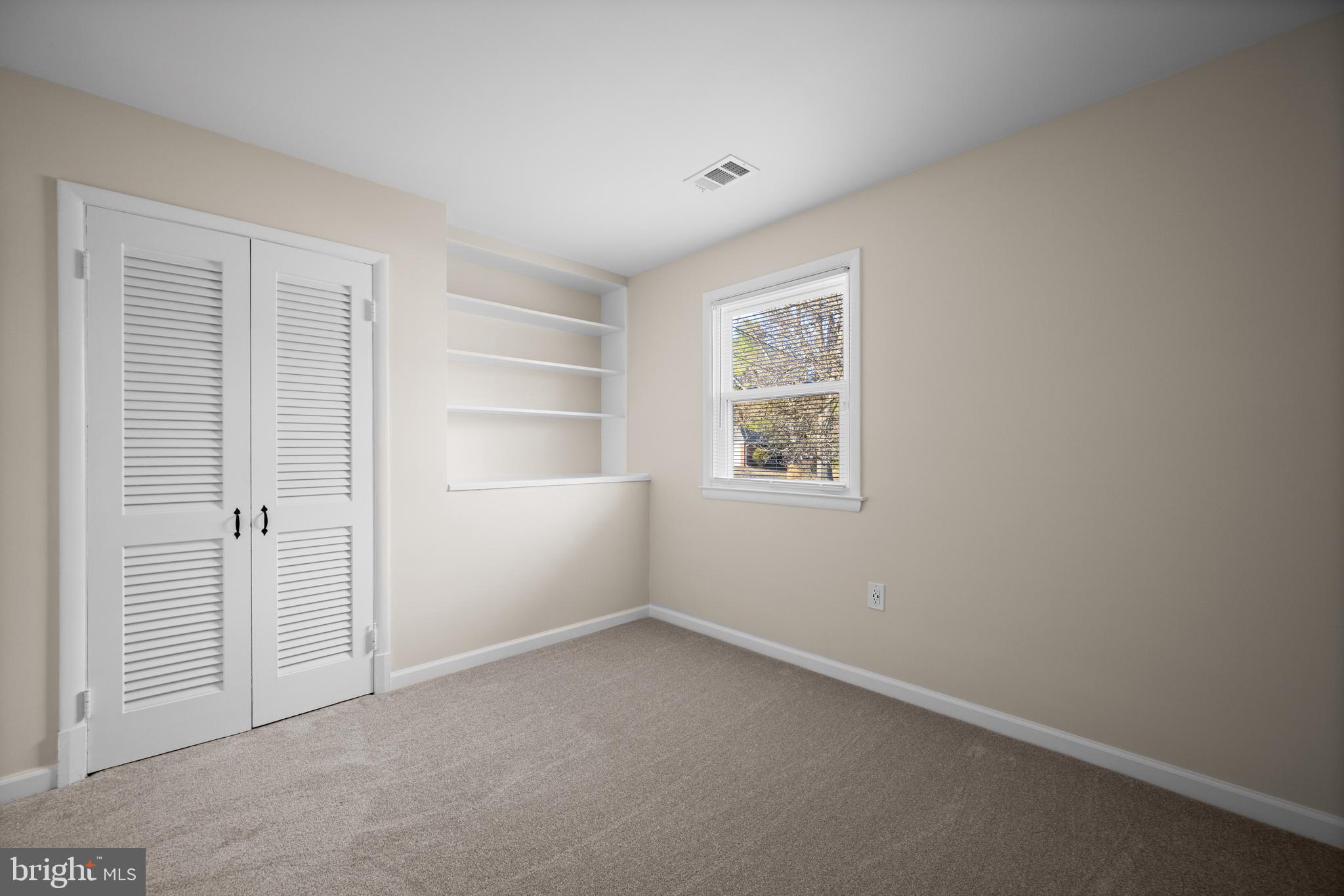 8711 Windsor Mill Road Windsor Mill, MD 21244 - Photo 18 of 35 an empty room with a window