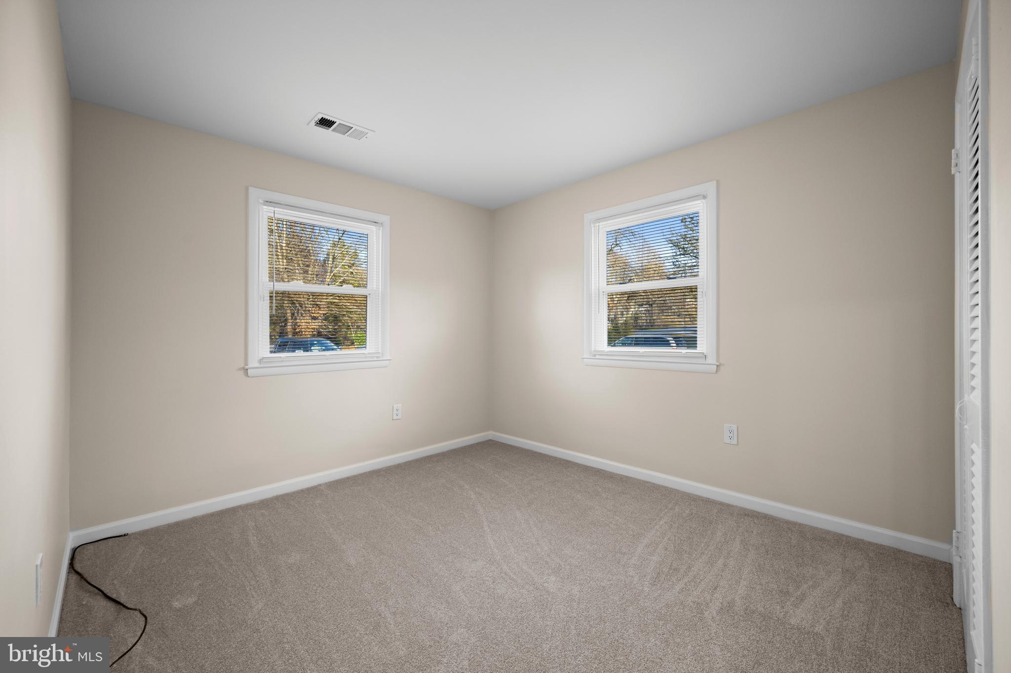 8711 Windsor Mill Road Windsor Mill, MD 21244 - Photo 20 of 36 an empty room with a window