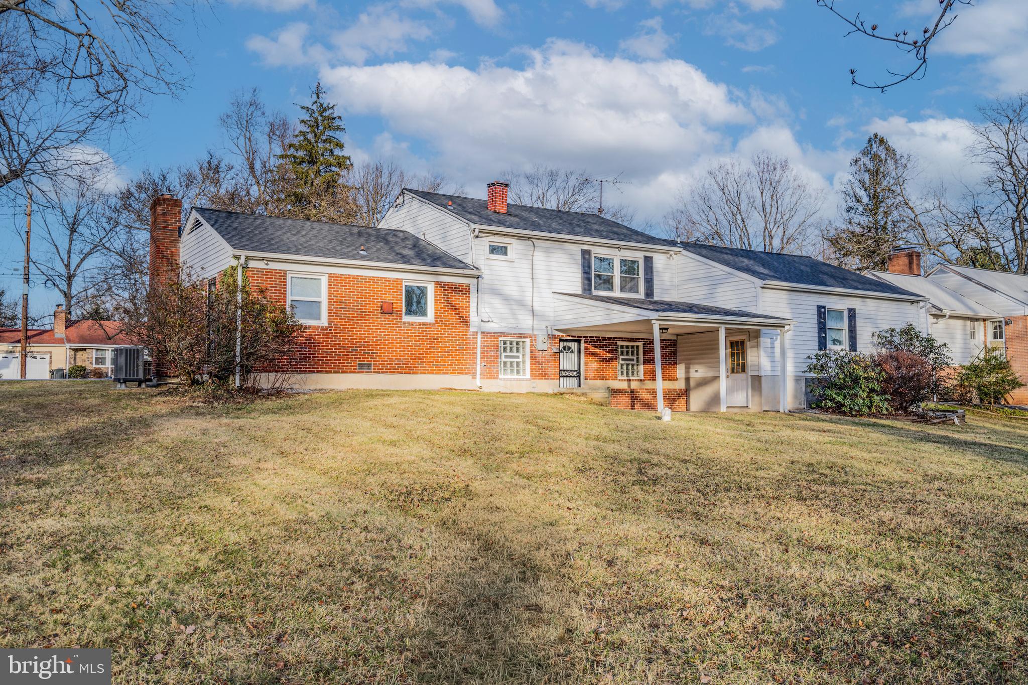 8711 Windsor Mill Road Windsor Mill, MD 21244 - Photo 33 of 36 front view of a house with a big yard