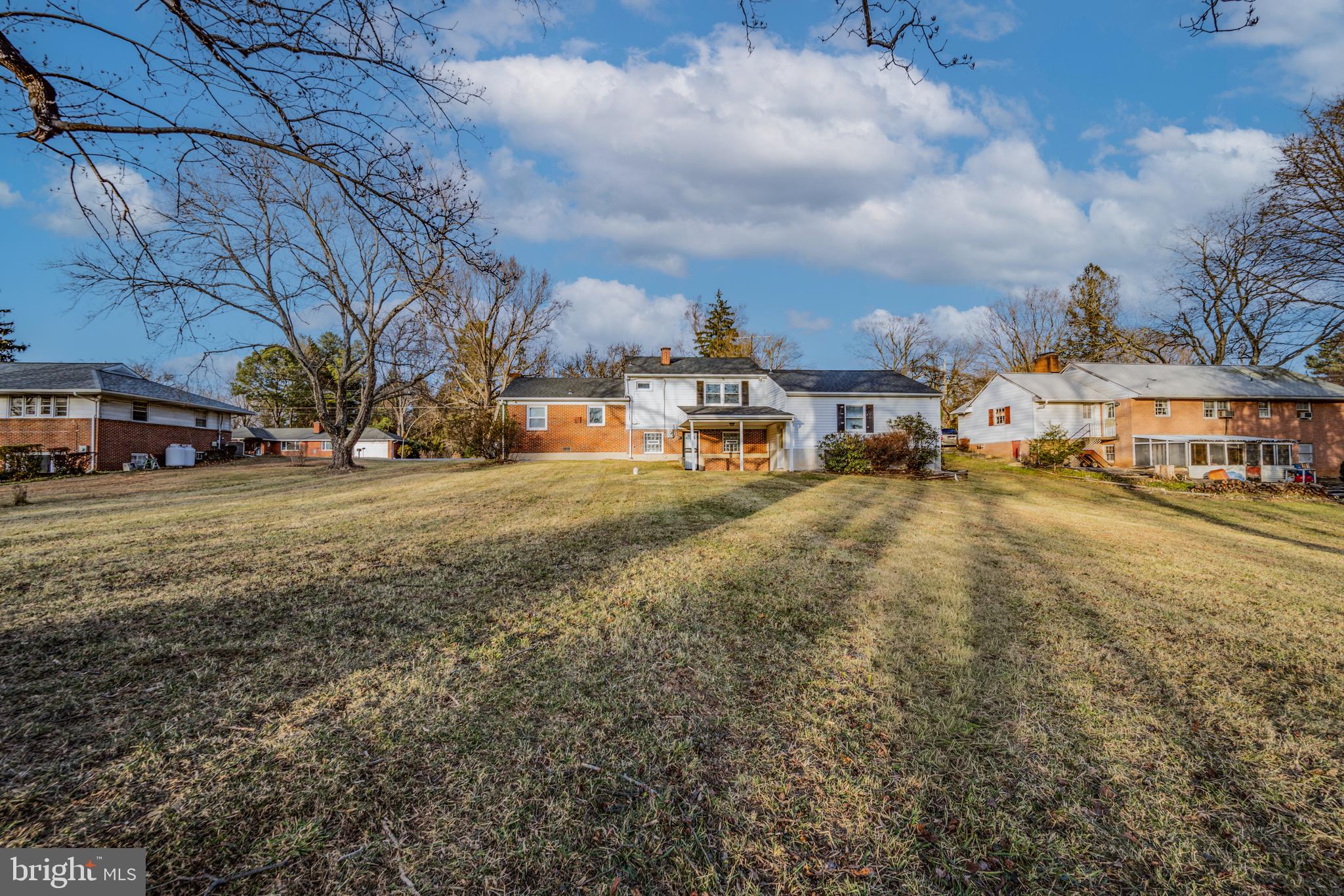 8711 Windsor Mill Road Windsor Mill, MD 21244 - Photo 34 of 35 a view of a street with houses