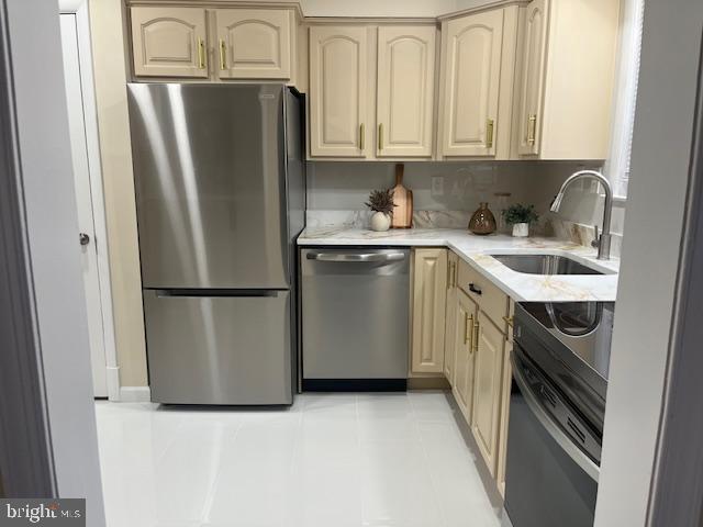 8711 Windsor Mill Road Windsor Mill, MD 21244 - Photo 5 of 36 a kitchen with stainless steel appliances granite countertop a refrigerator and a sink