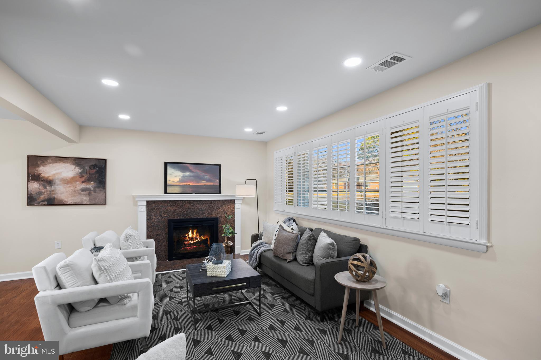 8711 Windsor Mill Road Windsor Mill, MD 21244 - Photo 7 of 35 a living room with furniture window and a fireplace