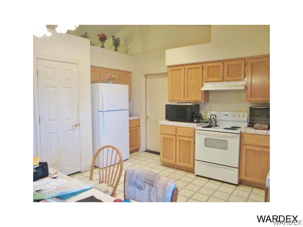 987 South Escuela Road, Unit 82 Golden Valley, AZ 86413 - Photo 13 of 26 To Garage