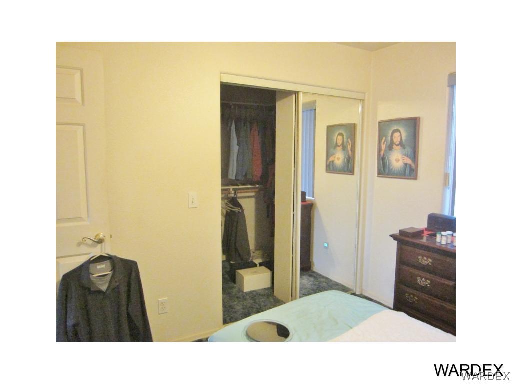 987 South Escuela Road, Unit 82 Golden Valley, AZ 86413 - Photo 18 of 26 Walk In Closet
