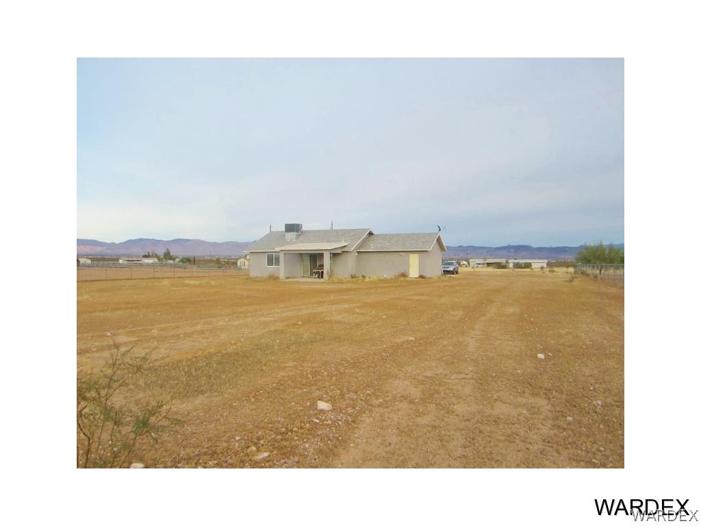 987 South Escuela Road, Unit 82 Golden Valley, AZ 86413 - Photo 25 of 26 Rear of Home
