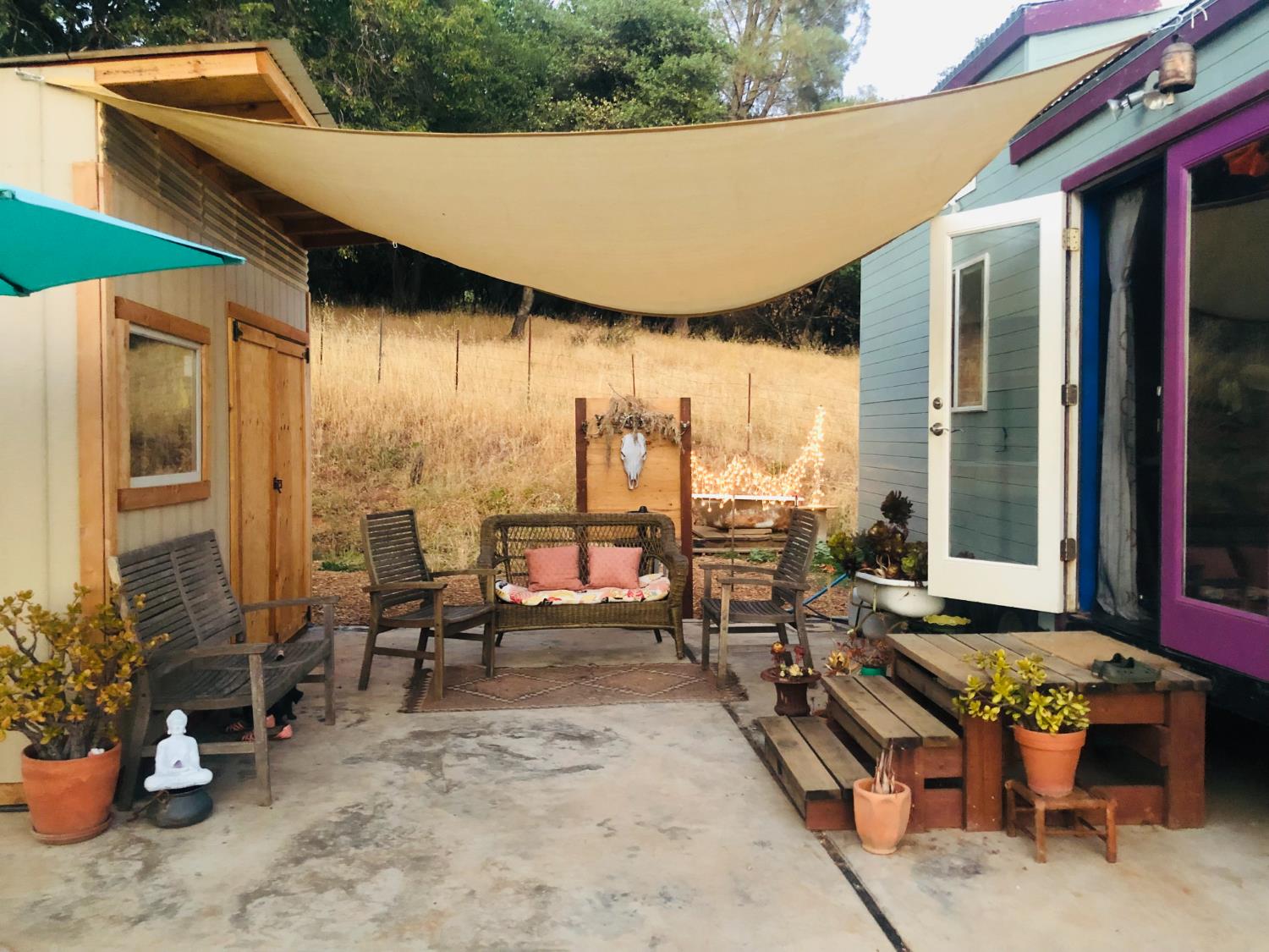 7708 La Porte Road Rackerby, CA 95972 - Photo 1 of 1 a building outdoor space with furniture and potted plants