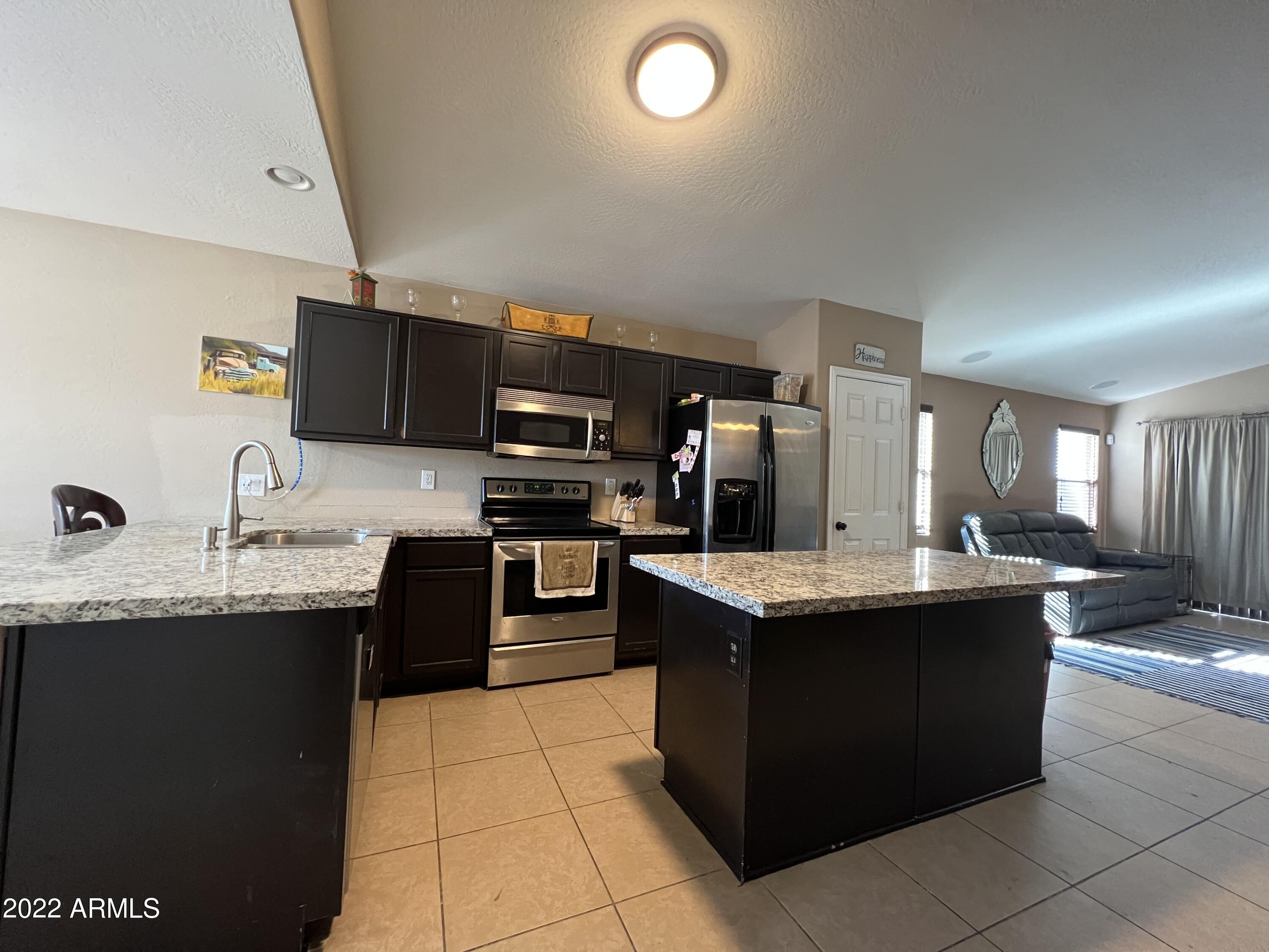 4524 West Fremont Rd. Laveen, AZ 85339 - Photo 9 of 19 DC331D3F-090D-4EB2-895B-9F607430841A